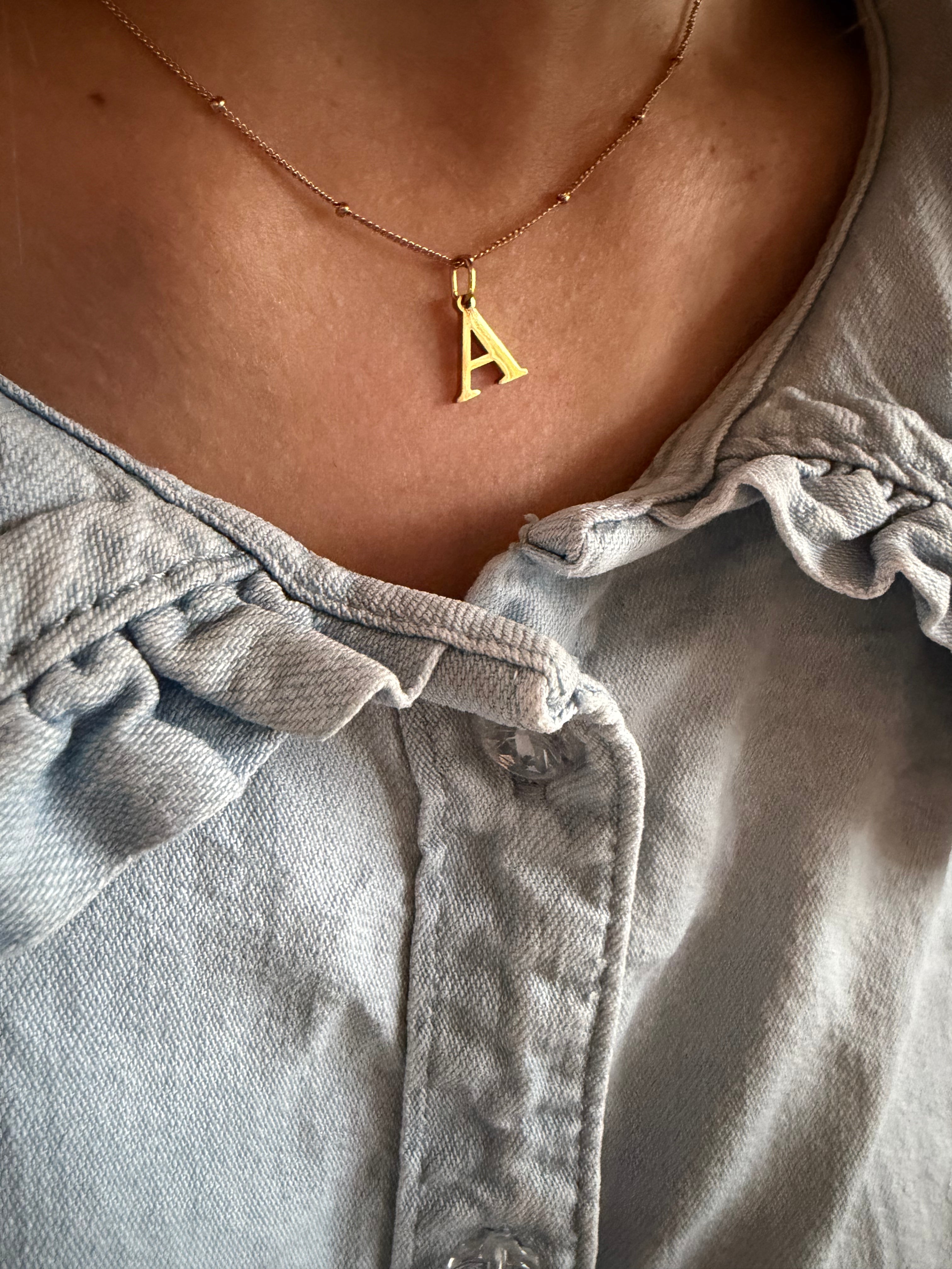 Ketting met bolletjes goud